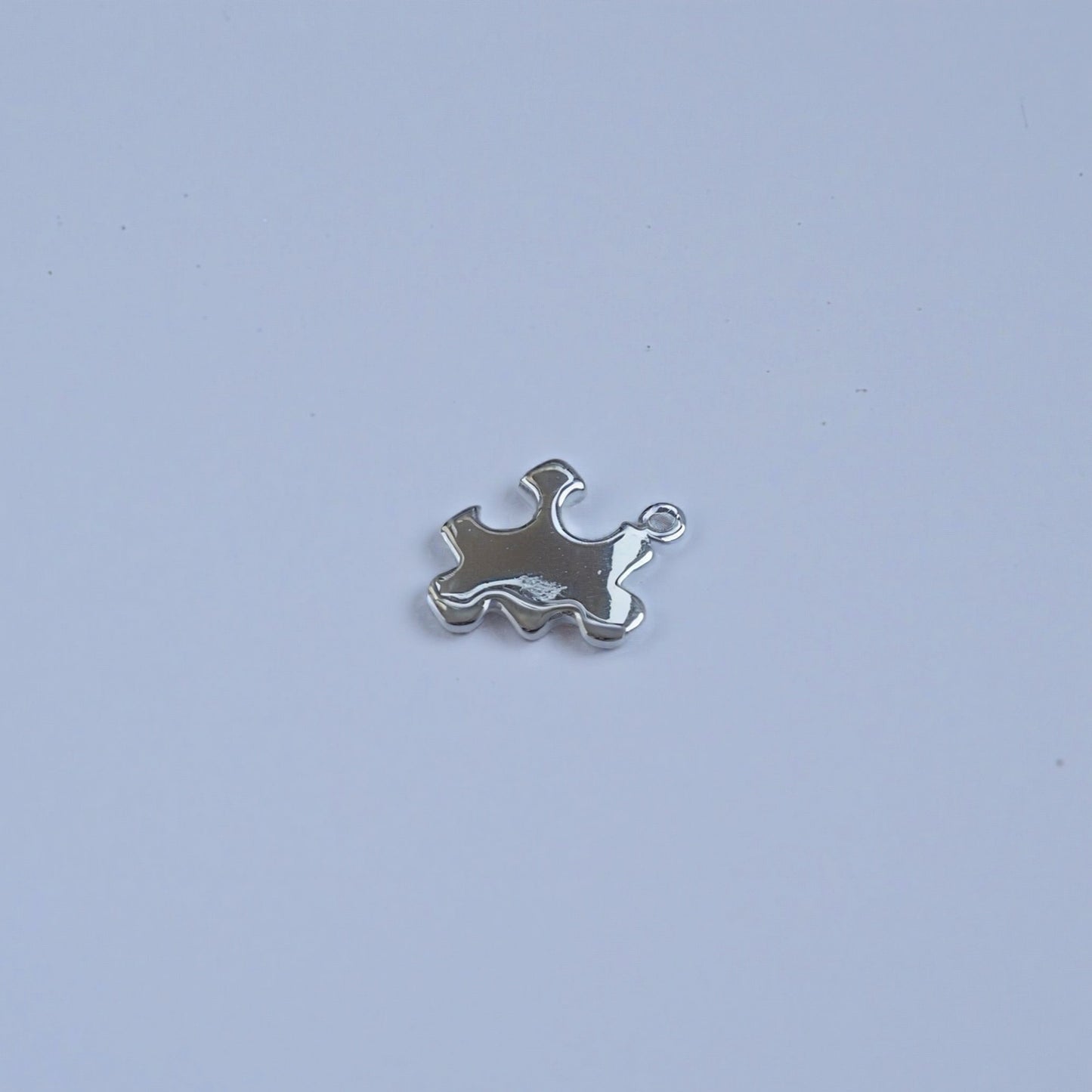 silver puzzle charm